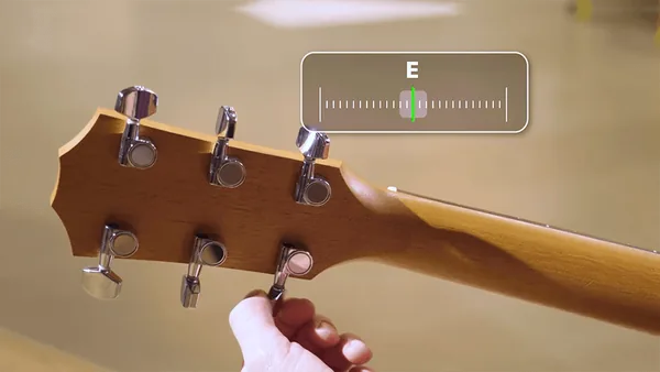 Adjust the tuning peg